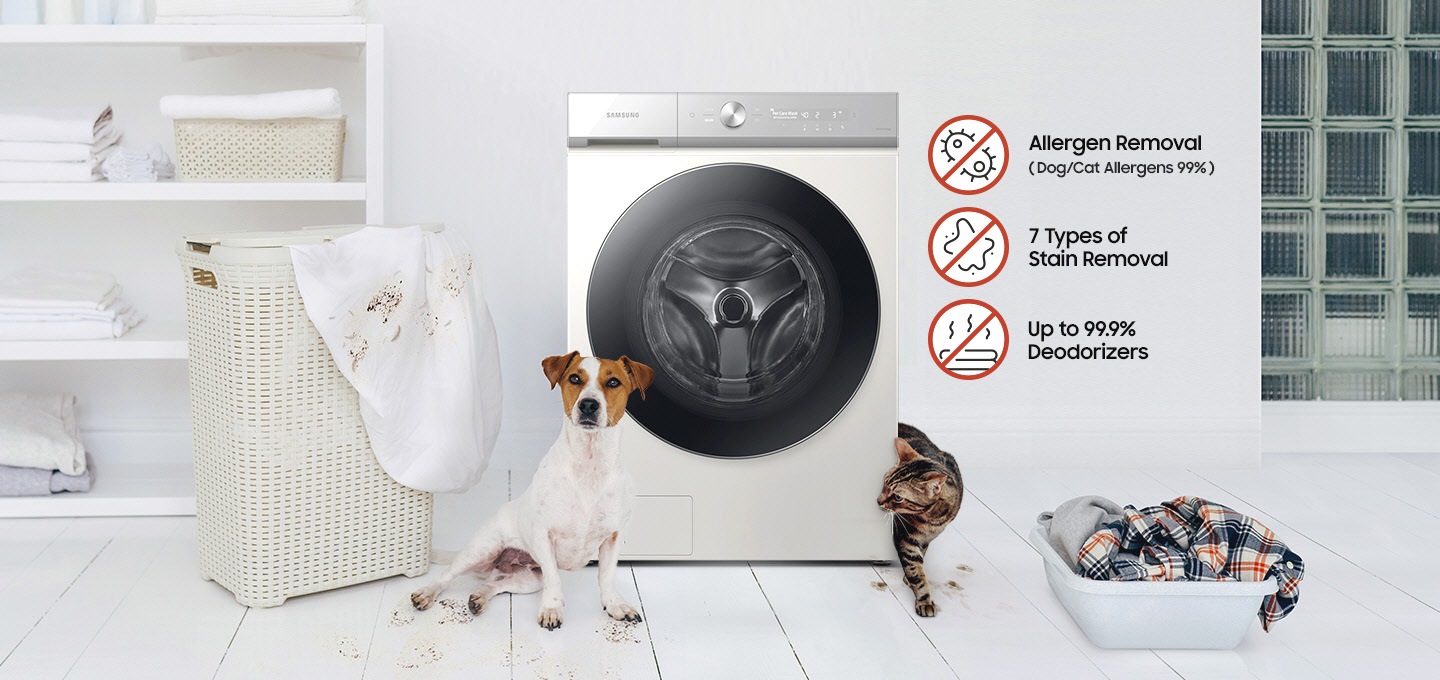 A white Bespoke Grande AI washer is in a white room with a dog and a cat. There is a container with laundry on the floor to the right of the machine. The animals’ paws are dirty and muddy footprints cover the floor where they have been walking. Allergen Removal (Dog/Cat Allergens 99%). 7 types of stain removal. Up to 99.9% deodorizers.