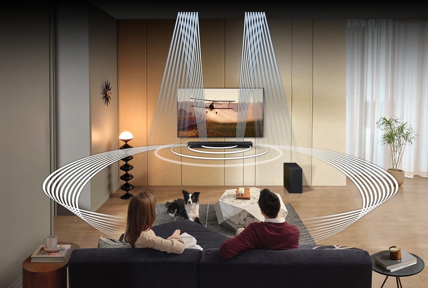 A man and woman are surrounded by sound waves that come out of the Q800C's front, side and up-firing speakers.