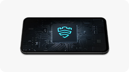 A Galaxy S23 FE displays Samsung Knox logo onscreen.