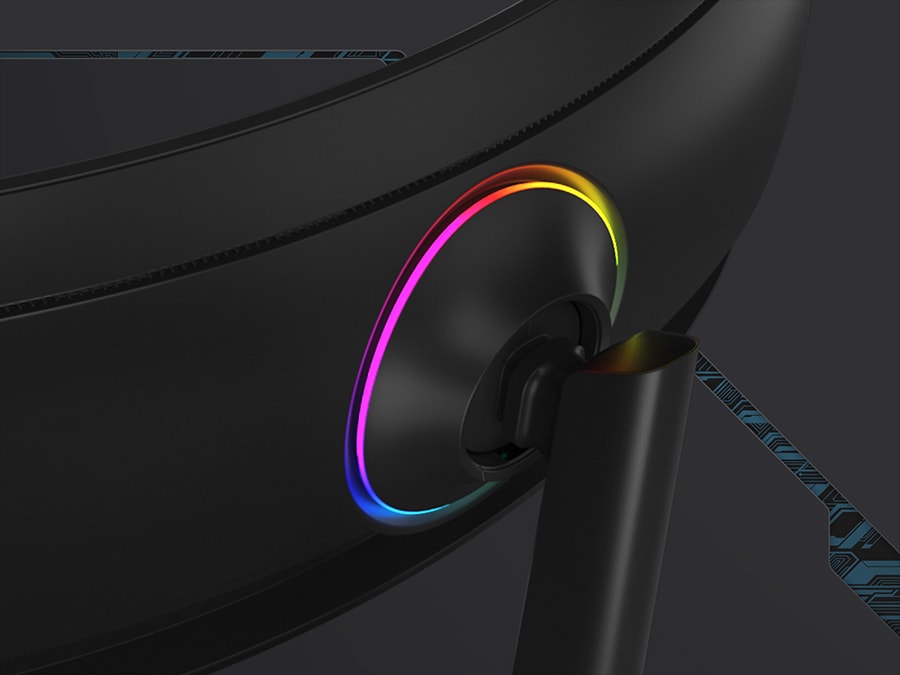 The rear of an Odyssey monitor is shown standing on a surface. On the back of the monitor shows a glowing multi-colored ring.