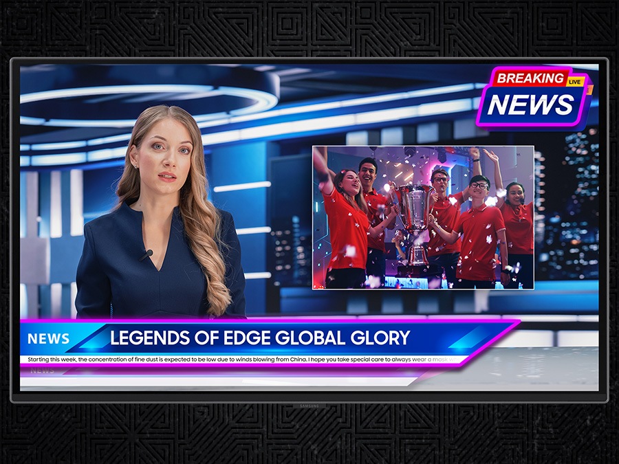 A newscaster sits at a desk, reporting on a breaking news story. A badge saying "Breaking News" is in the top right, with a lower third saying "Legends of Edge Global Glory." A picture of a winning sports team is to the right of the newscaster.