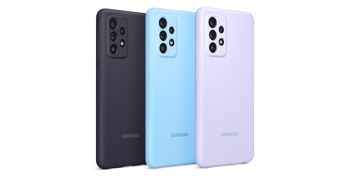 Rear view of Galaxy A52 with black Silicone Cover, Galaxy A52 with blue Silicone Cover and Galaxy A52 with violet Silicone Cover are tilted to the right. Three Galaxy A52's in vertical mode.