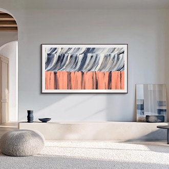 A wall-mounted Samsung The Frame TV displaying an abstract artwork blends in beautifully with the interior decor and the painting next to it. AI-generated image.