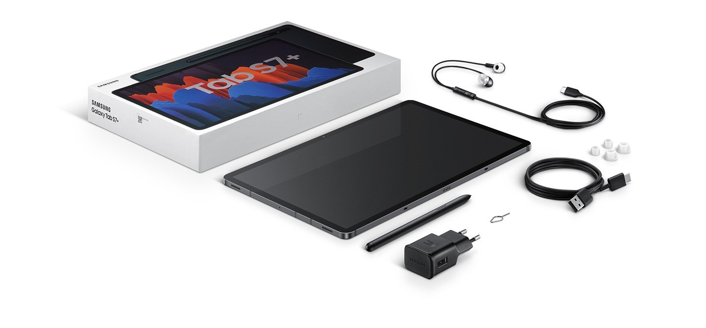Flat lay of items included in box with Galaxy Tab S7+. The packaging, the device, S Pen, travel adapter, USB Type-C earphones, data link cable, and SIM ejection pin