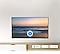 A microphone icon overlays a beach sunset TV screen image, demonstrating UHD TV voice assistant feature.