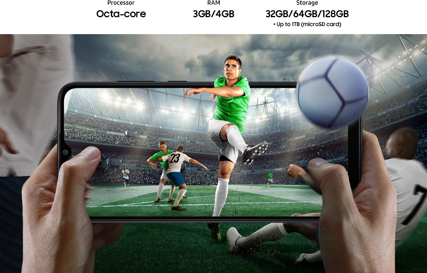 A football player, kicking a ball at a stadium during a football game, is shown on Galaxy A04e in landscape, held by two hands. The player, ball and the rest of the picture extend outside of the device's screen in all directions. Storage options include 32GB, 64GB and 128GB, and up to 1TB external storage.