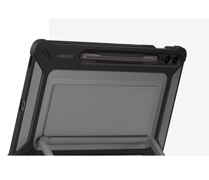 A back view of Galaxy Tab S9 FE+ covered with an Outdoor Cover, propped up using the kickstand and showcasing the S Pen holder.