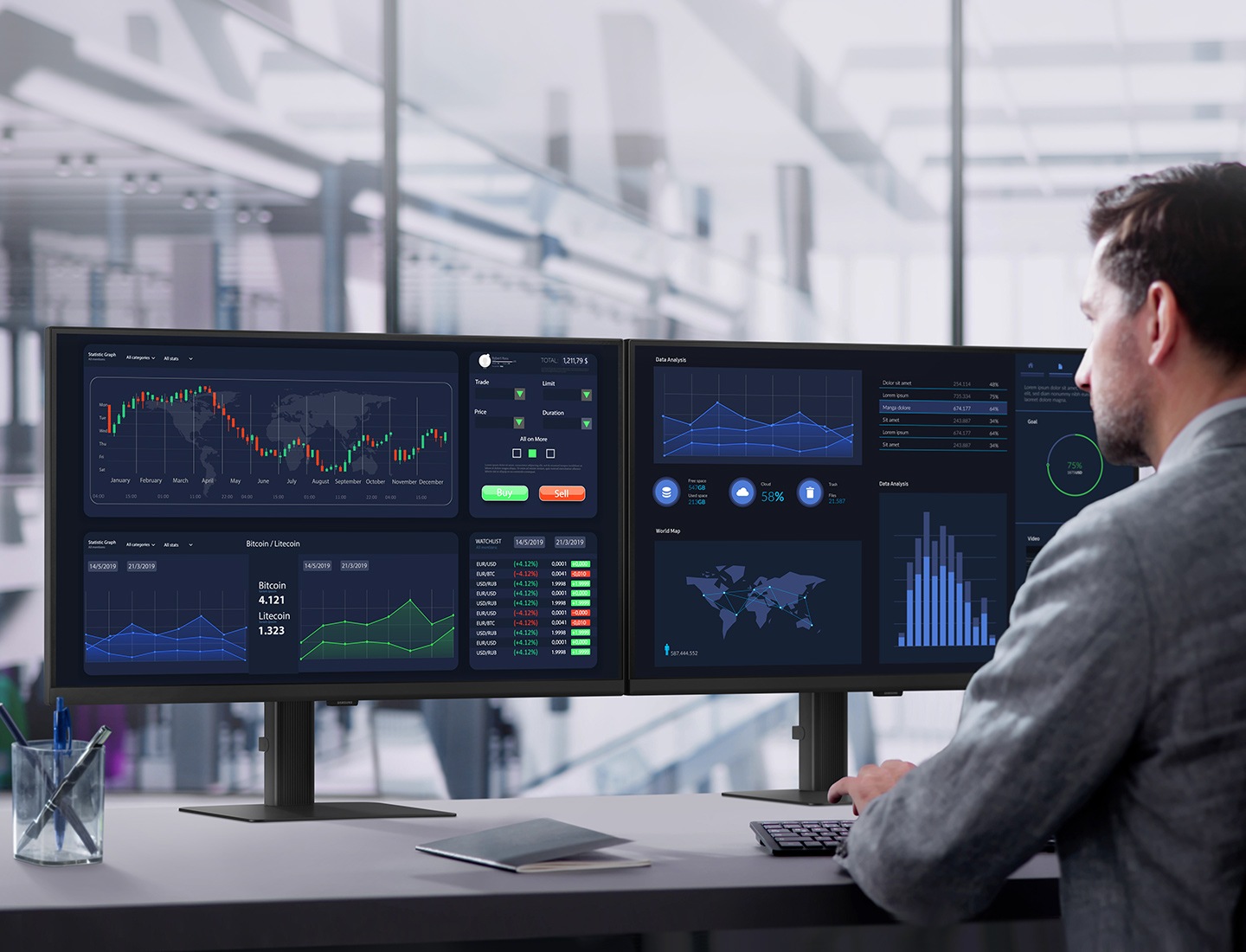 A man works at a desk, using a keyboard and two monitors side by side. The monitors show graphs and maps. Above him, text reads "Expand your creative realm".