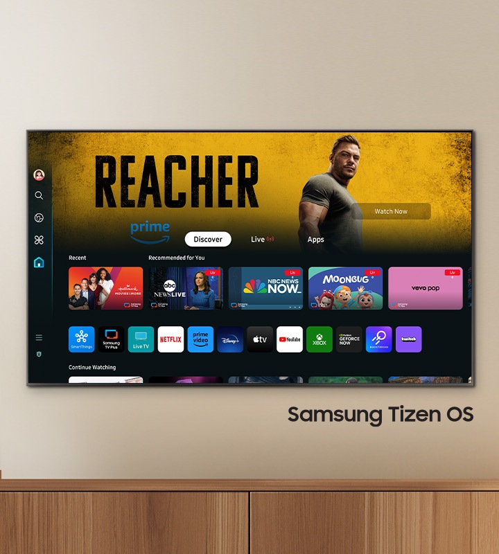 A wall-mounted TV shows popular apps and curated content on the home menu. "Samsung Tizen OS"