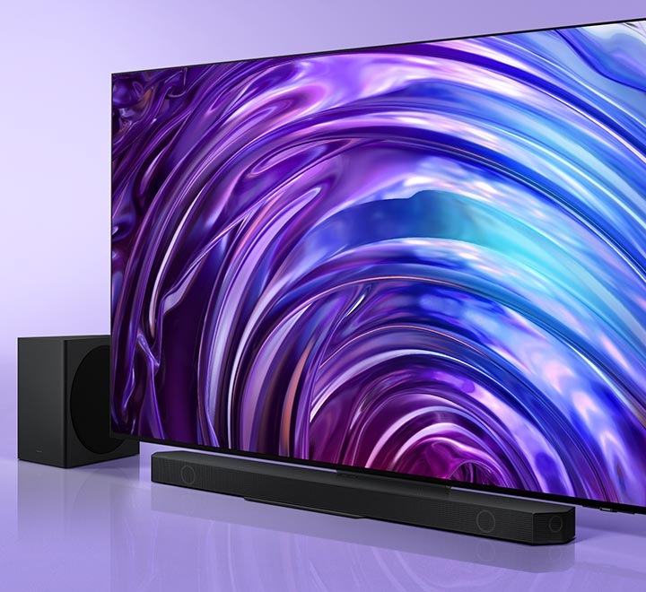 A big-screen TV with a Soundbar and subwoofer. Roon Tested logo.