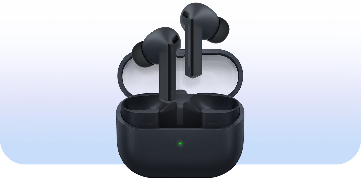 A pair of Black Galaxy Buds3 FE earbuds hovering above the open Galaxy Buds3 FE case.