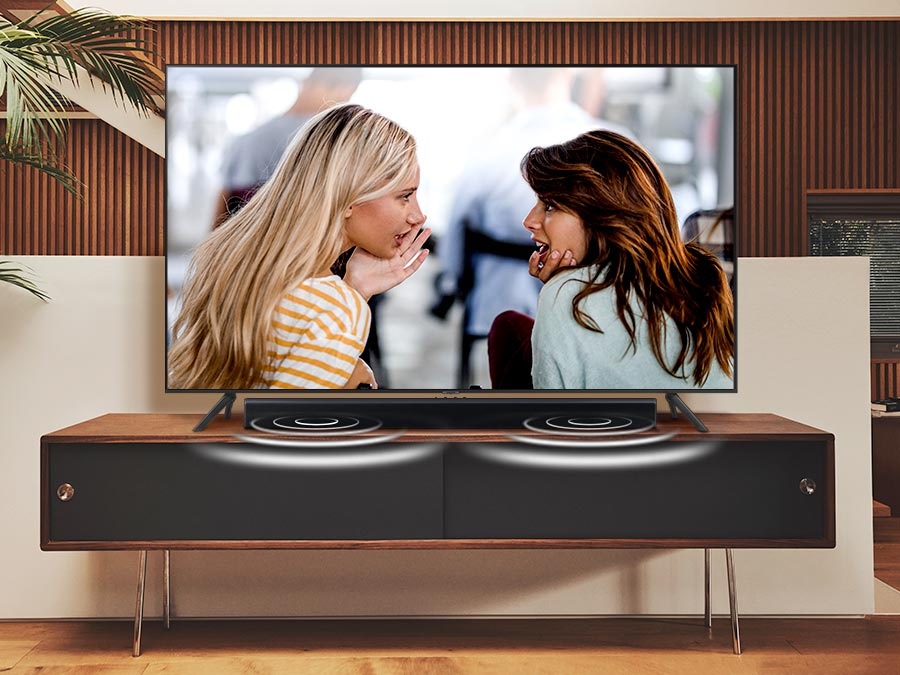 The sound from the Soundbar's side speakers emphasize dialogue when Voice Enhance is activated.