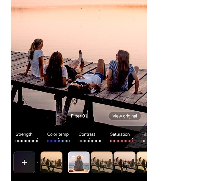 Picture of friends on a dock is being shot with a filter applied. Various custom filters can be applied while shooting.
