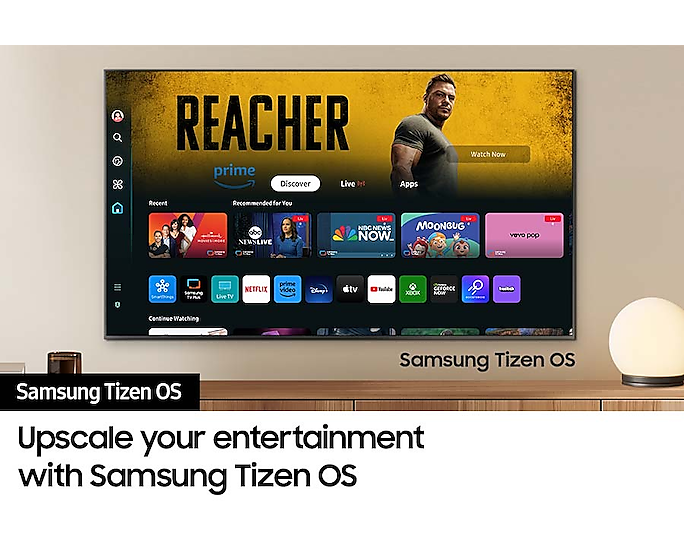 A wall-mounted TV shows popular apps and curated content on the "Samsung Tizen Smart Hub" home menu.