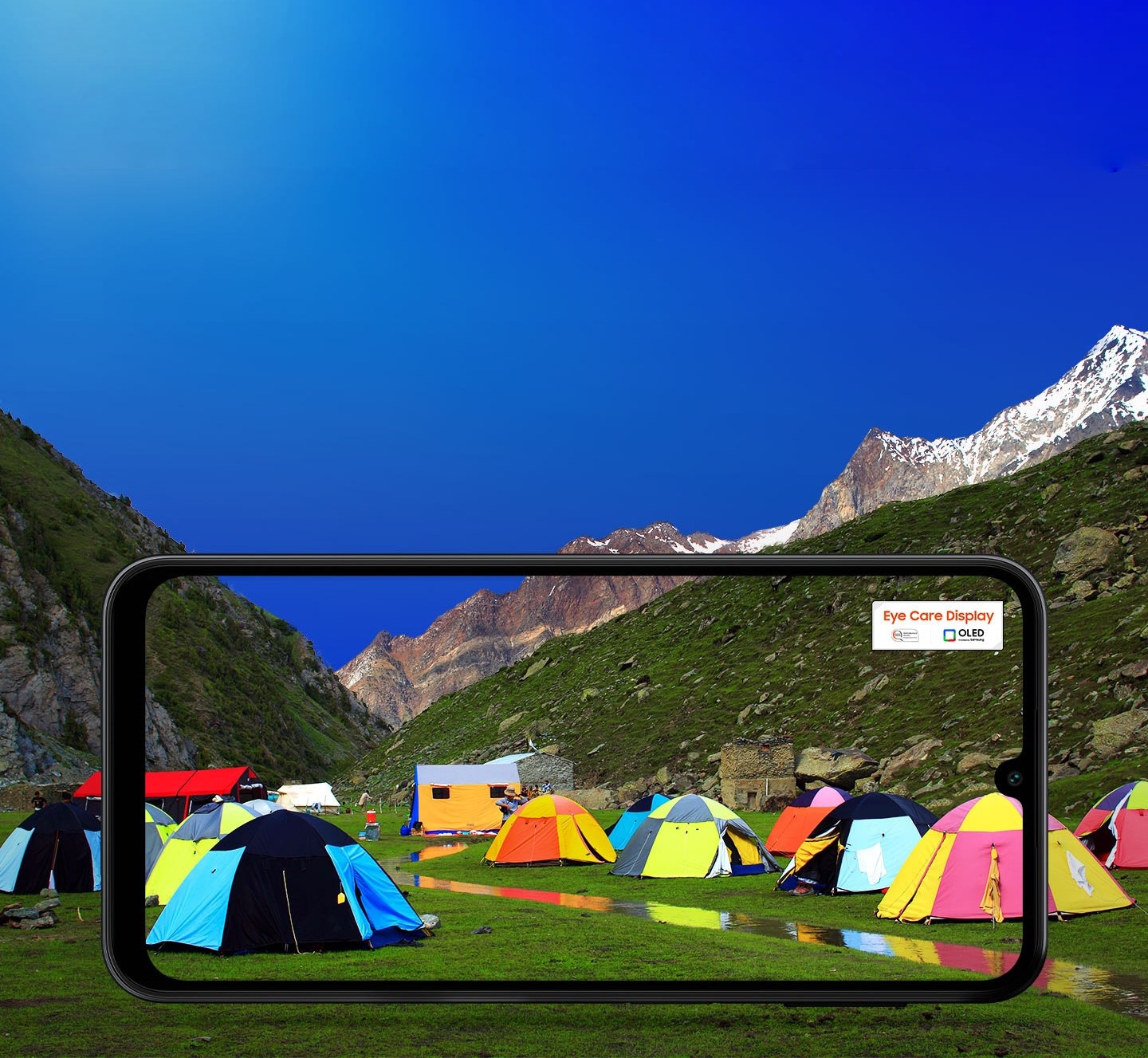 Galaxy A24 with a mountain valley backdrop and overlaid scenery on its screen. In the top right corner of the screen, there is an Eye Care Display certification logo. SGS Performance tested. OLED provided by Samsung.