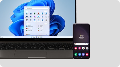 A graphite Galaxy Book3 is opened and facing forward with the MS Home Screen shown onscreen. A Galaxy S23 Plus device is placed in front of the laptop with the Home Screen shown onscreen.