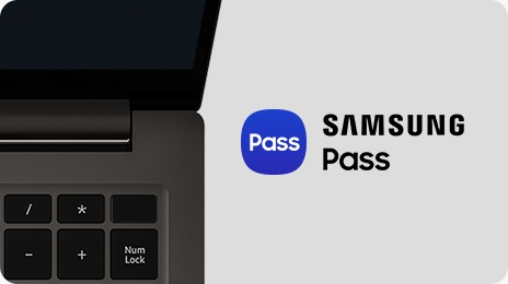 A top close-up view of the right side of a graphite Galaxy Book3, open and facing forward. On the right is the Samsung Pass logo.