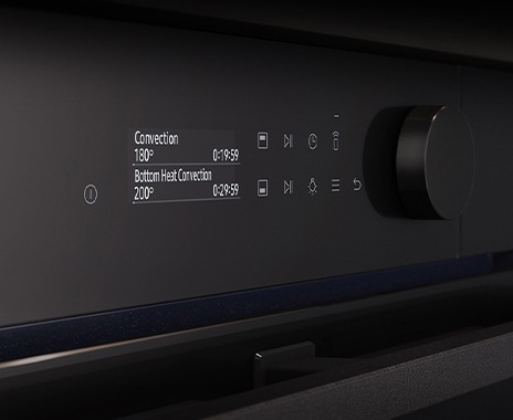 Shows a close-up of the oven's stylishly minimalist control panel with an LCD display, touch control and a single knob.