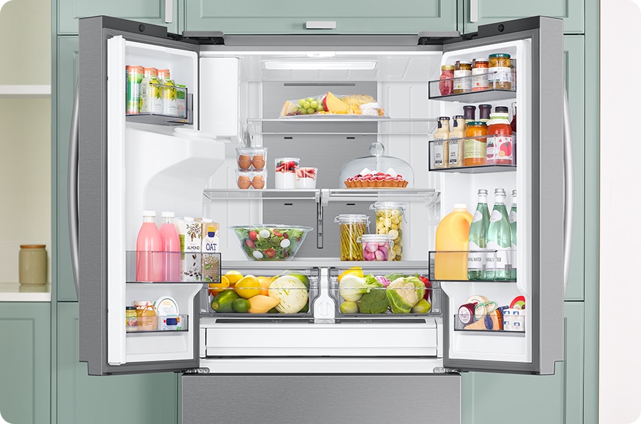 A refrigerator filled with various foods is open. Cool air comes out through vents in each compartment to maintain the optimum temperature for the food to stay fresh.