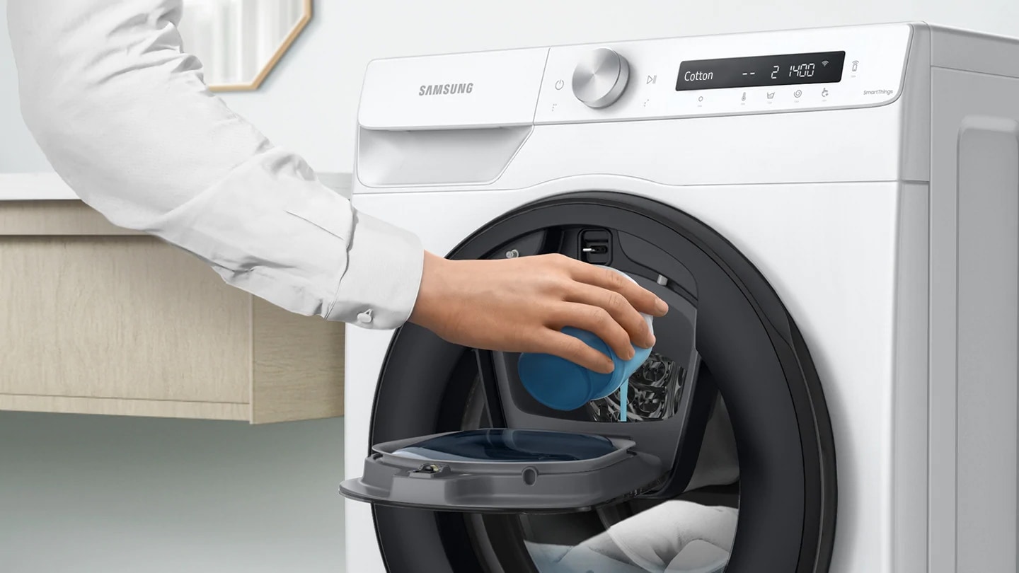 Extra detergent is added into the open AddWash™ door by hand.