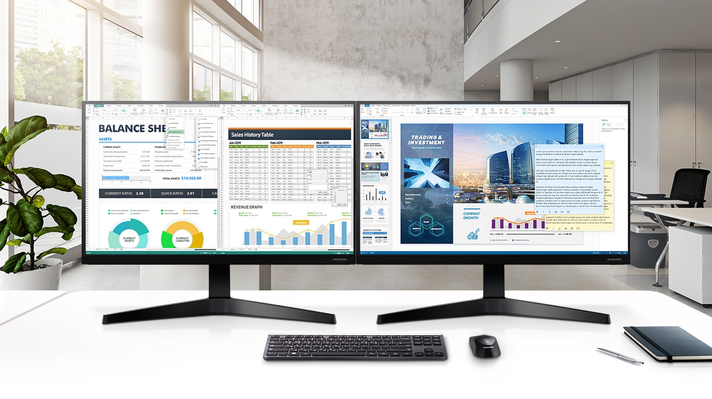 Two monitors are set side-by-side and those screens look seamlessly connected thanks to super thin bezels