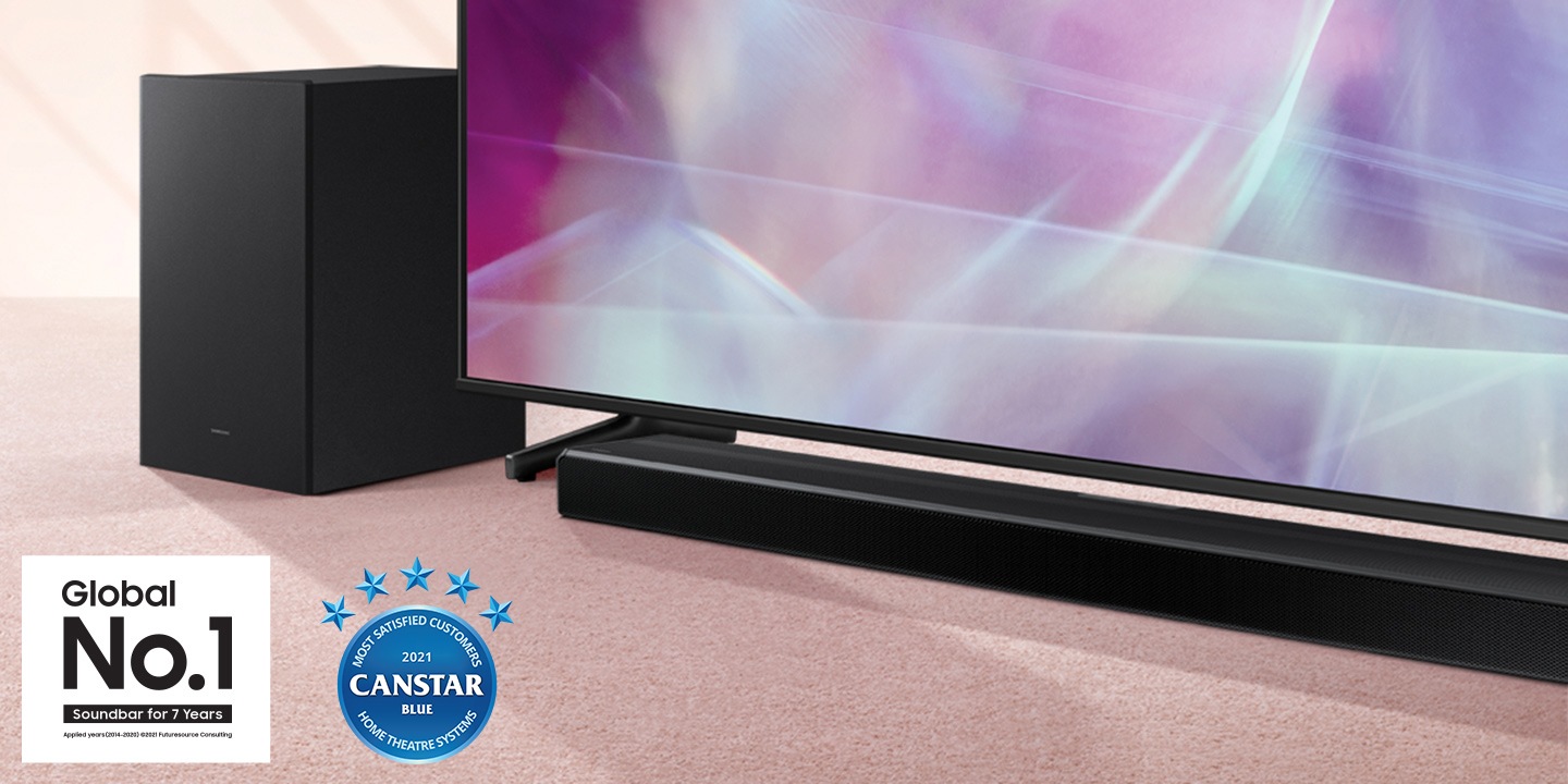 Q600A Soundbar and subwoofer are positioned next to QLED TV.