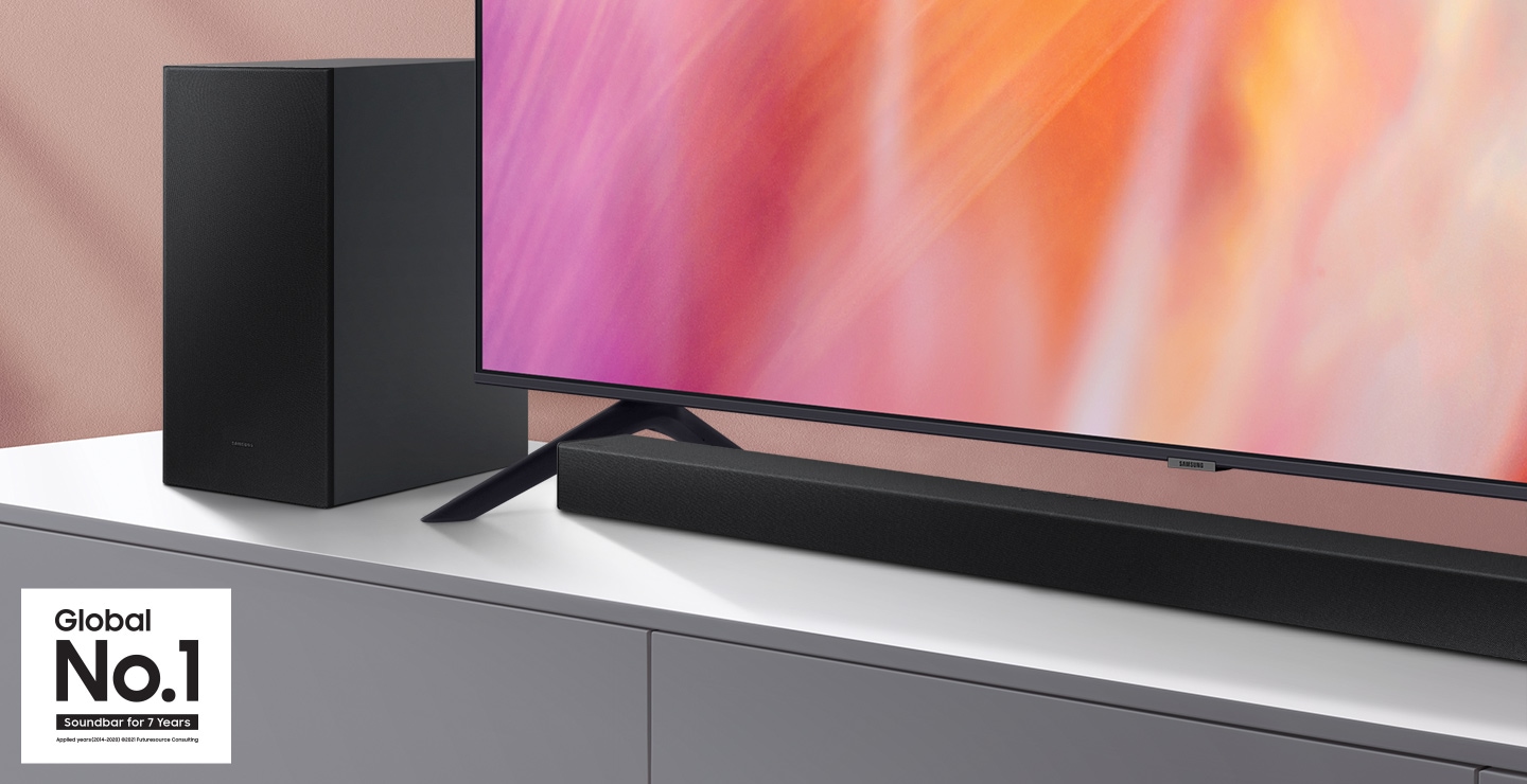 A series Soundbar and subwoofer are positioned next to Crystal UHD TV.