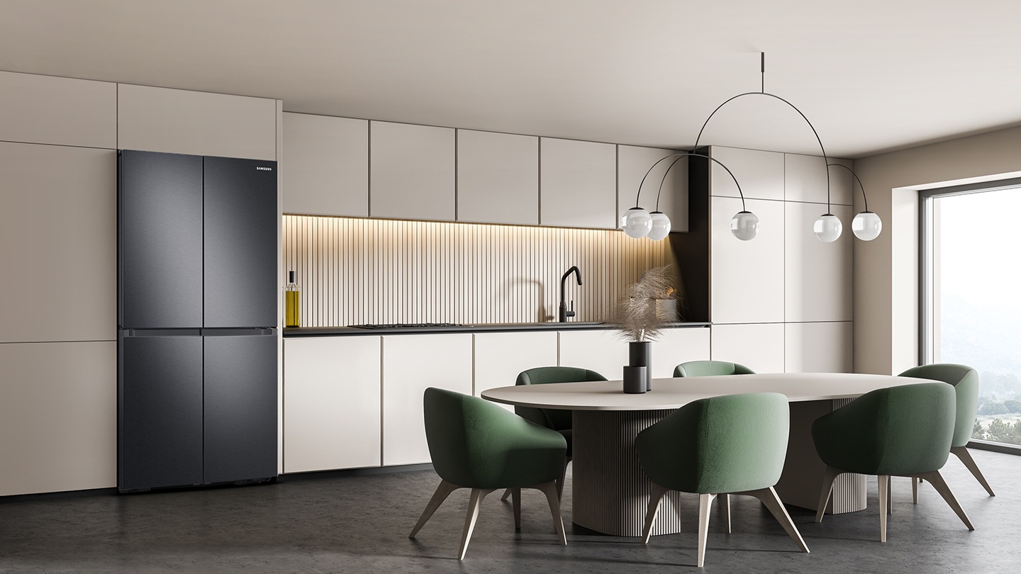 The sleek exterior of the fridge gives a clean look to the modern kitchen, with a flat finish and no recessed handles.