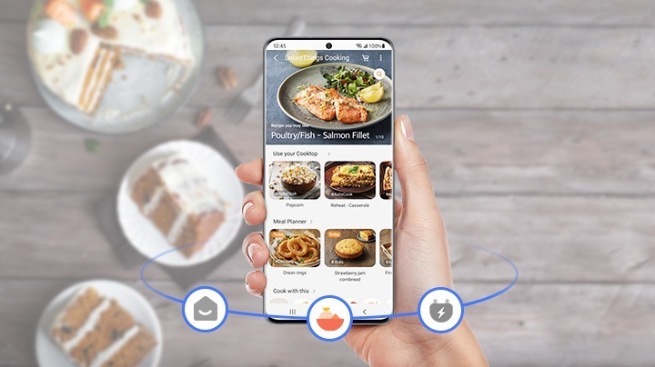 A person is using the SmartThings Mobile App for cooking.