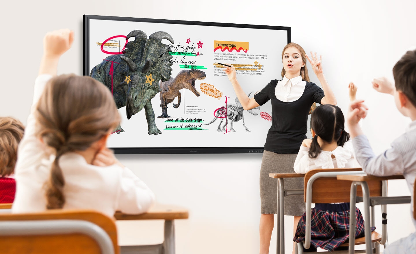 In a classroom, a teacher uses the Flip 3 to instruct students.