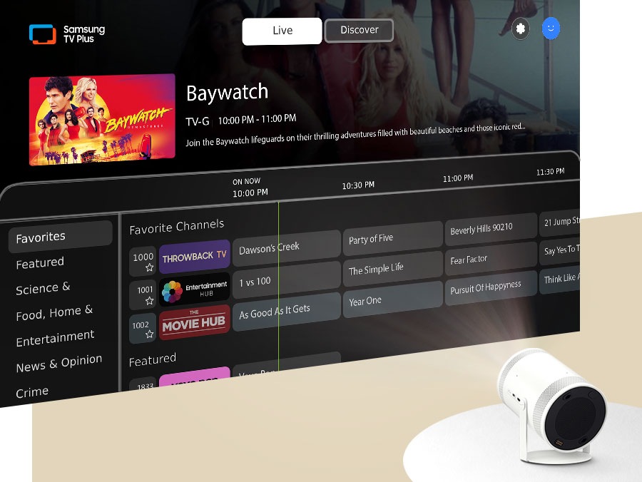 The Freestyle beams Samsung TV Plus channels onto the wall. Onscreen is the TV Plus GUI.