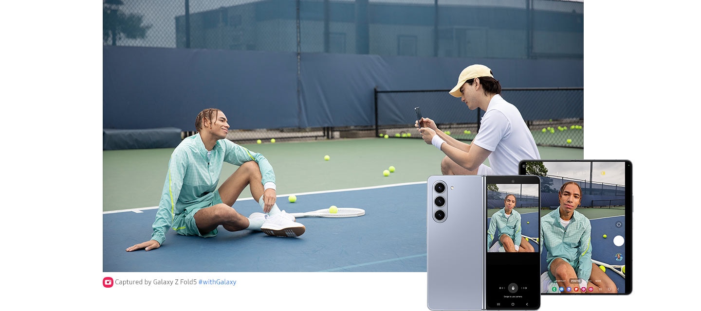 A tennis player poses for a photo on the tennis court. A teammate kneels in front to take the photo with the Rear Camera of an unfolded Galaxy Z Fold5. The photo taker observes the Main Screen while the photo subject observes the Cover Screen. Next, the photo preview is displayed on the Cover Screen as well as the Main Screen.