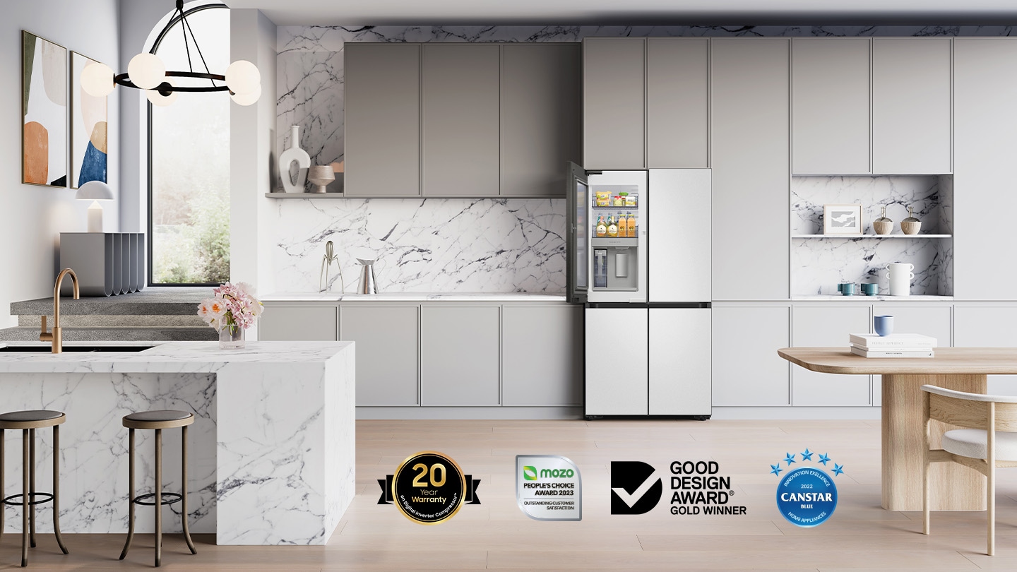 Placed in a stylish kitchen, the refrigerator blends seamlessly with the tones of the room.