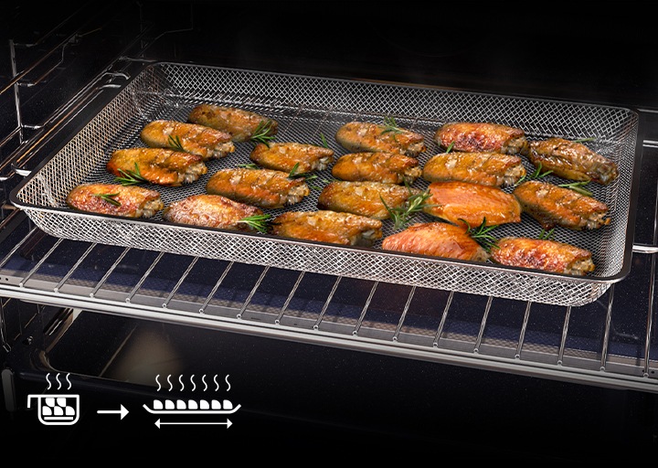 Shows food in the oven being fried with only a small amount of oil using Air Fry.