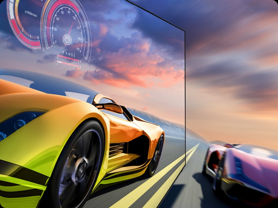 2 race cars are racing on a track. 1 looks clearer than the other and is going faster.