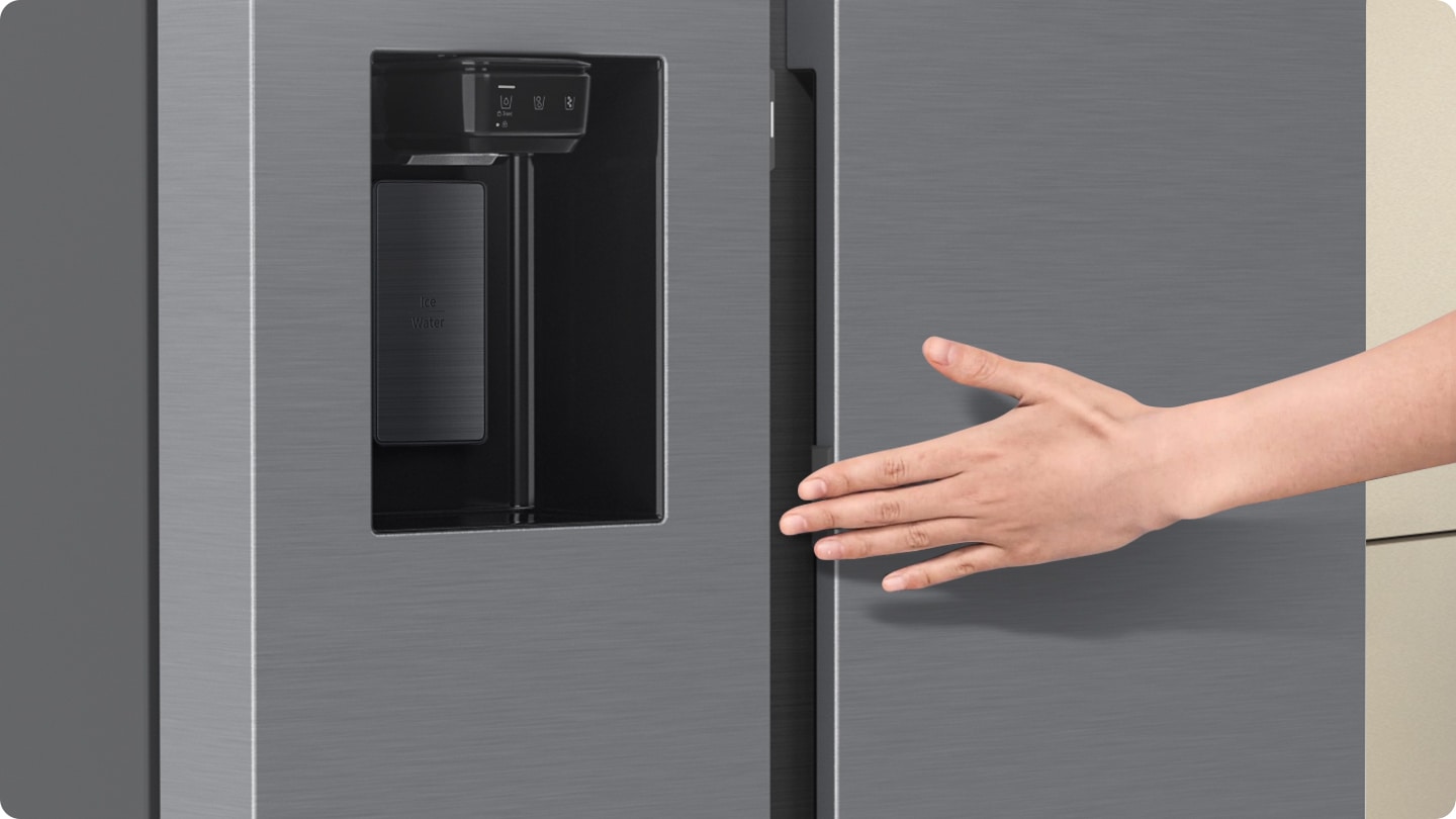 A hand slightly touches the Auto Open Door's touch sensor and the door automatically opens.