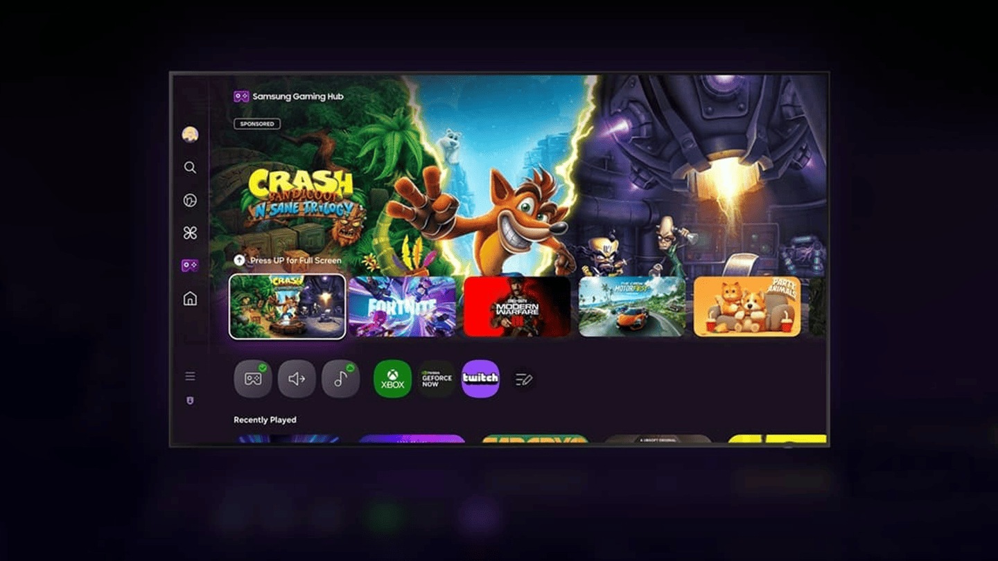 A TV displays the Samsung Gaming Hub home screen, which has options for streaming and playing games.