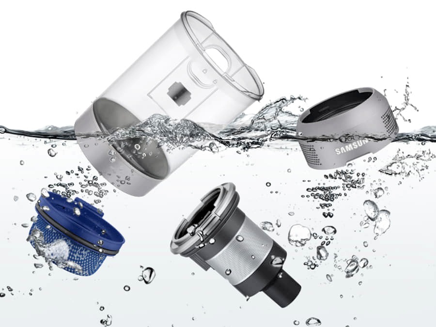 The dust canister is completely separated and contained in water to be cleaned.