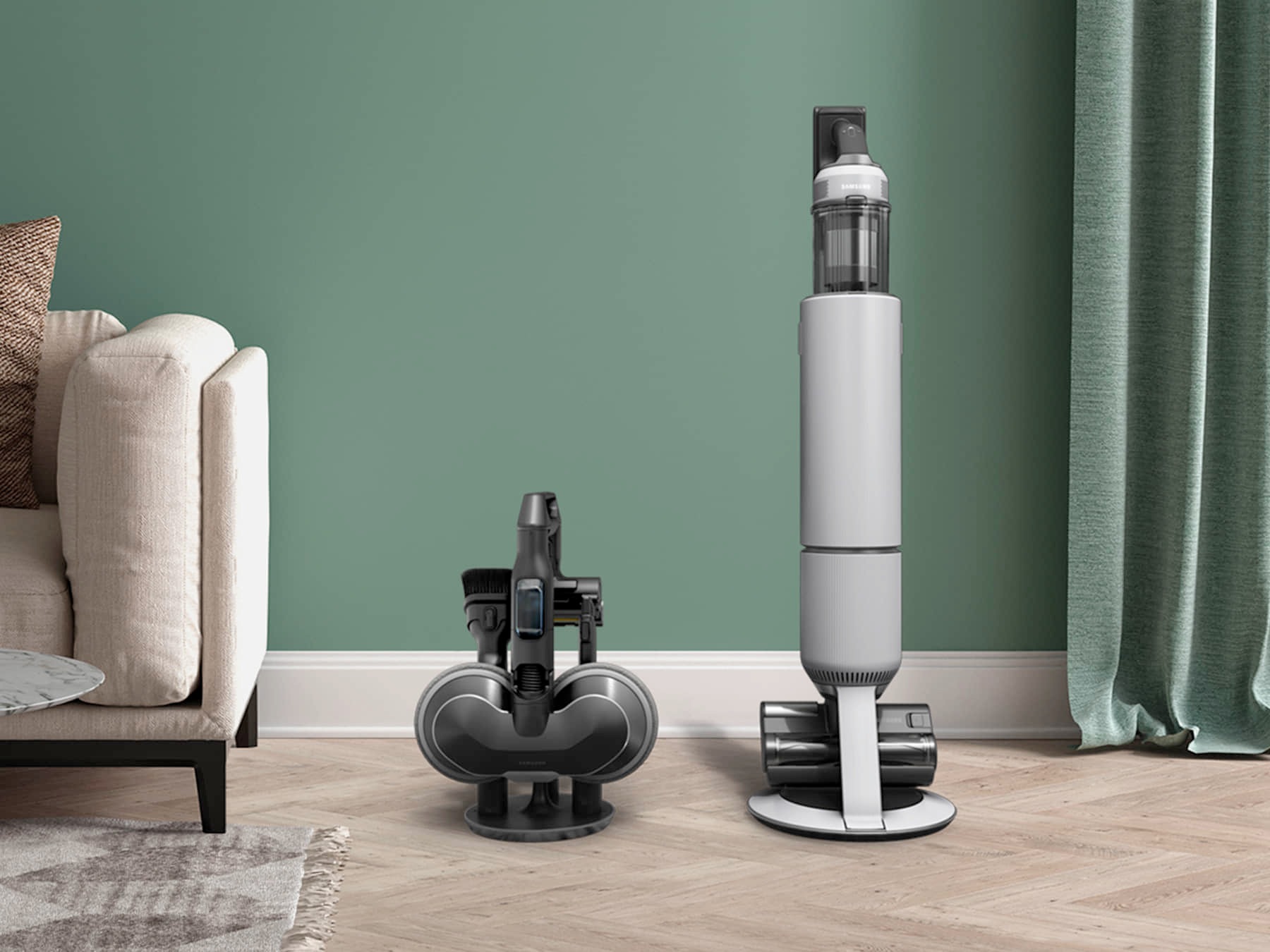 The Accessory Cradle and Clean Station are standing next to a clean green wall and a beige sofa.
