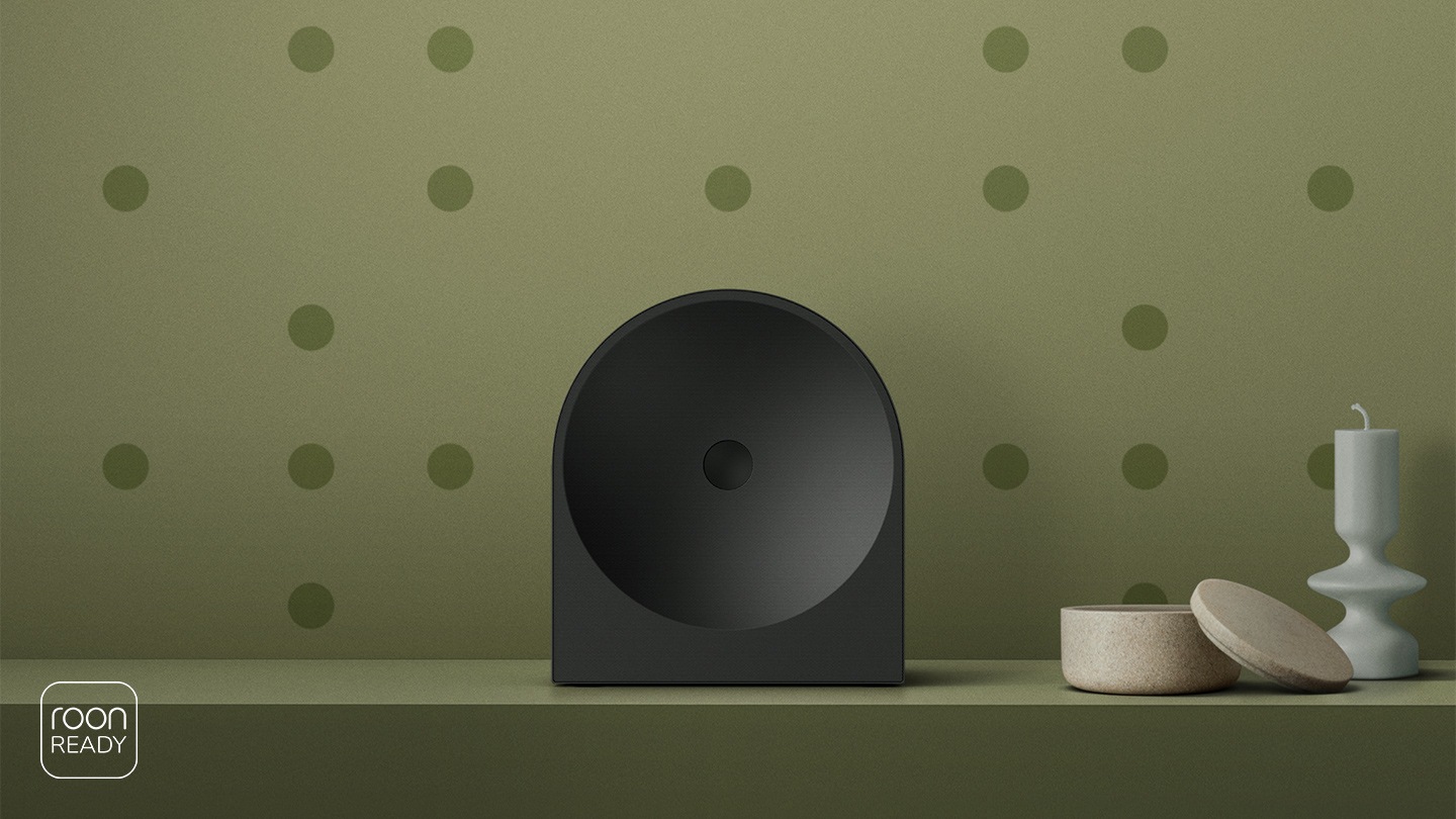 Key Visual of Music Studio 5 speaker displayed like a sculptural object against a patterned backdrop, emphasizing elegant design where sound and art meet.