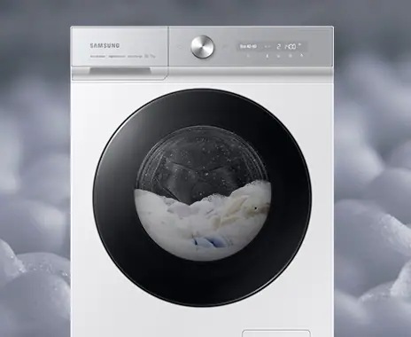 Auto dispense highlight shows washing being done with bubbles in the machine shown to be the appropriate amount.