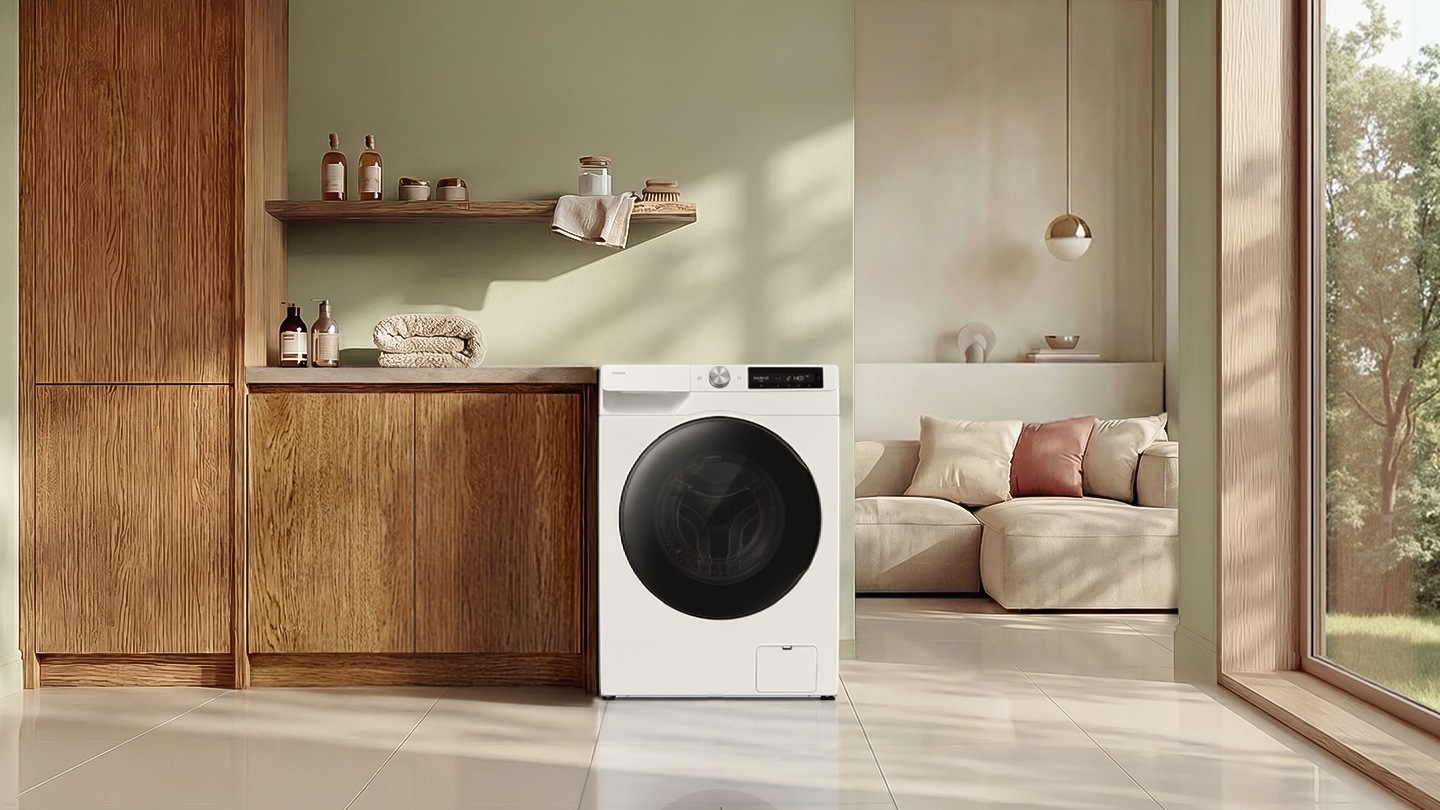 The washer is installed in a modern laundry room.