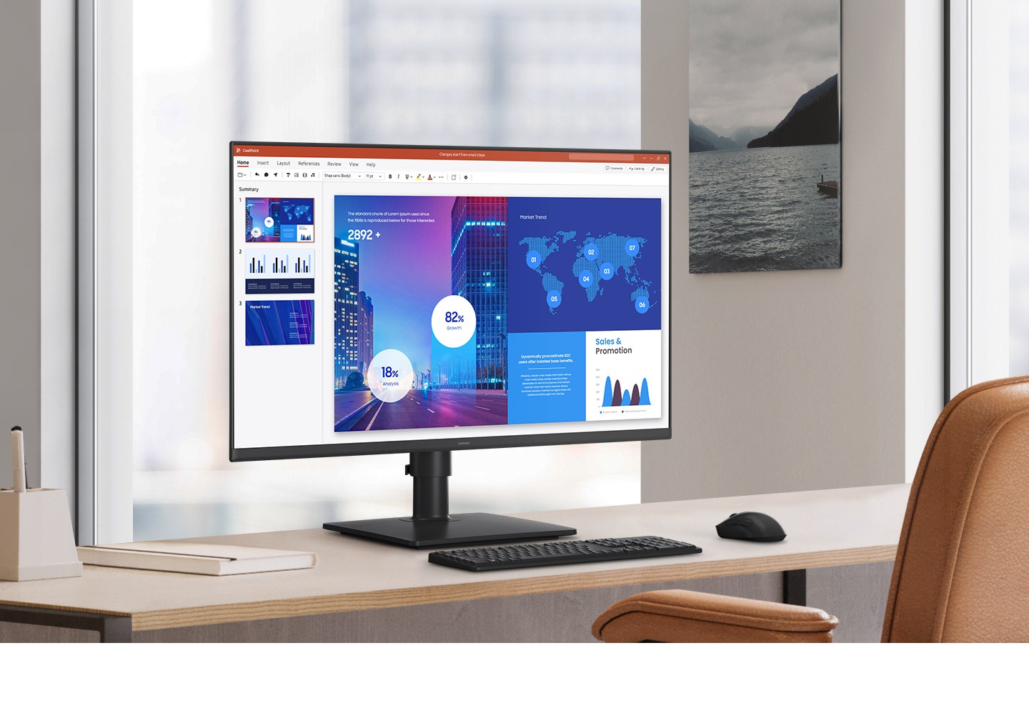 There is a Essential Monitor S4 in a office with a document on it.