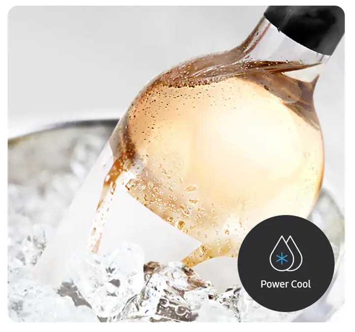 A bottle of white wine is being chilled in ice with Power Cool, and a steak is being frozen quickly with Power Freeze.