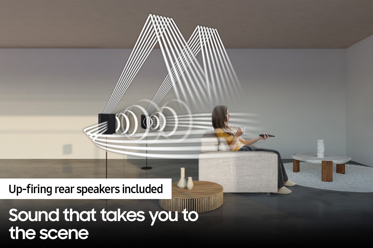 Soundwave graphics demonstrate Q930B wireless rear speaker's upfiring capability in addition to normal sound output direction.