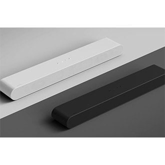 A black and white Soundbar are placed parallel next to each other. 