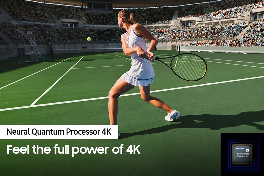 A woman is playing tennis in front of a large crowd. The Neural Quantum Processor 4K processes objects on display and enhances the entire scene. Neural Quantum Processor 4K is on display in the lower left hand corner.