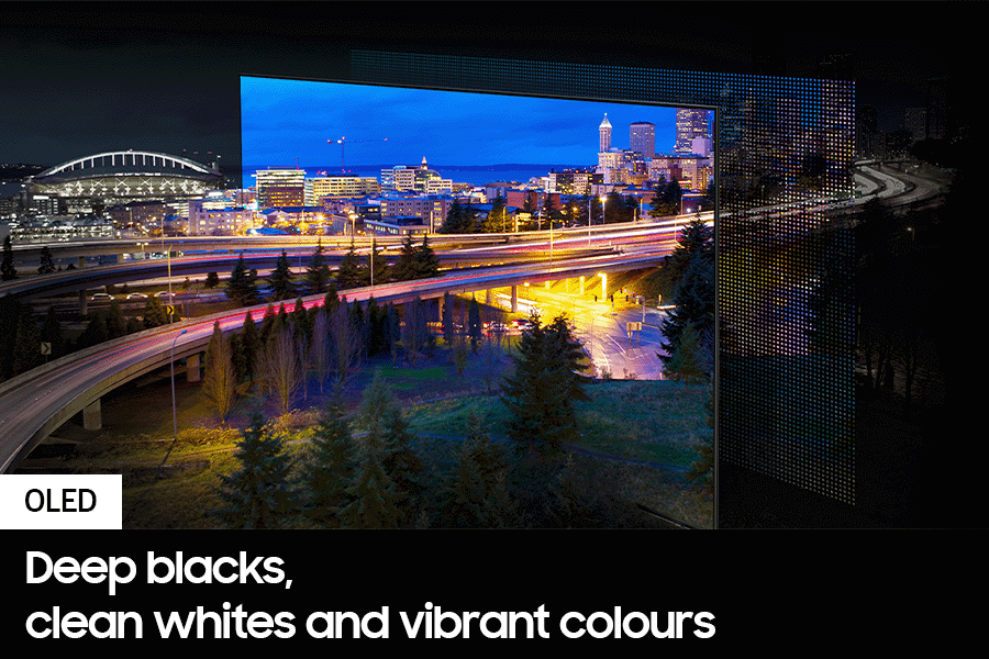 A city lit up by bright lights is on display. The colors and lights are vivid as OLED lights portray through the QD screen.