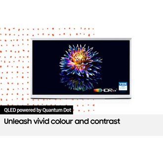 A flower is blooming on The Serif's screen in vivid color. The 'HDR 10+' and 'VDE' logos are on display in the bottom.