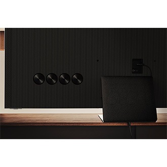 Samsung Neo QLED QN95B is showing the Infinity One Design design with TV stand